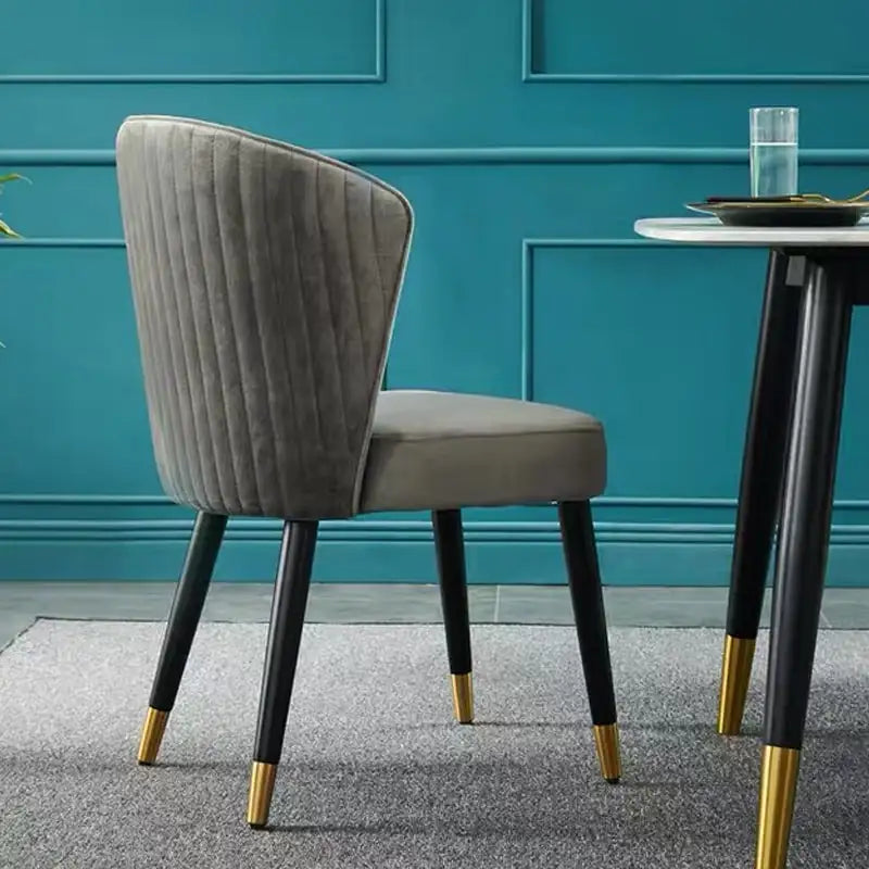 Each chair is upholstered in soft velvet or suede-like Nova Fabric, available in cream, grey, blue, green, or teal.