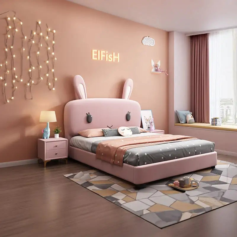 Plush bunny ears and embroidered eyes children’s bed with mattress pink wood base